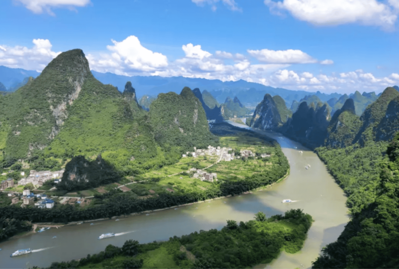 1-Day Guilin Tour: Reed Flute Cave, Xianggong Hill, Bamboo Rafting & Night Show