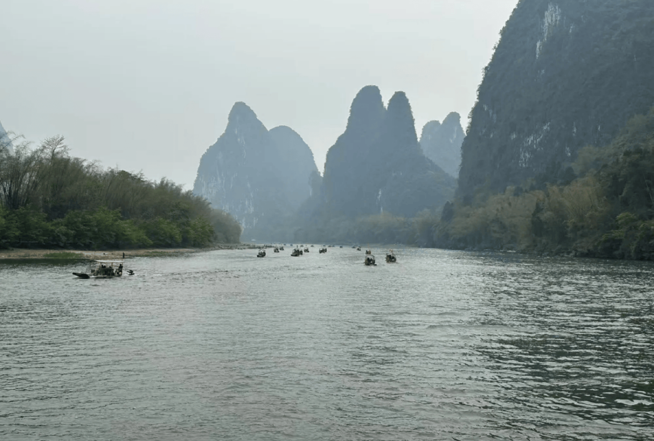 1-Day Guilin Tour: Reed Flute Cave, Xianggong Hill, Bamboo Rafting & Night Show 4