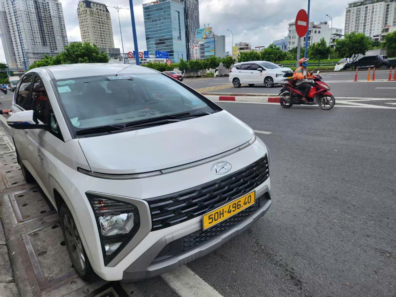 Uncle Thang Honda - City Tour With 7-seated Private Car in Ho Chi Minh