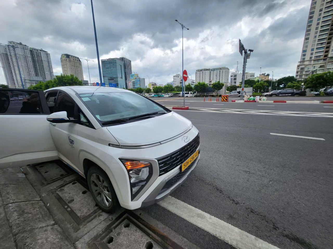 Uncle Thang Honda - City Tour With 7-seated Private Car in Ho Chi Minh 2